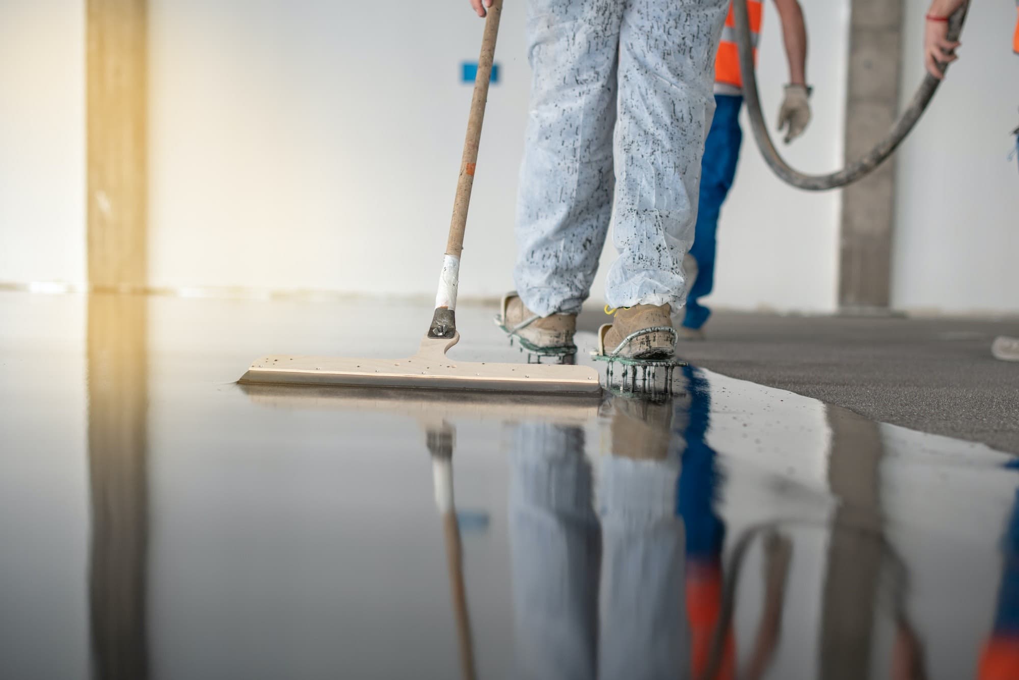 Epoxy Flooring Toowoomba team applying epoxy flooring